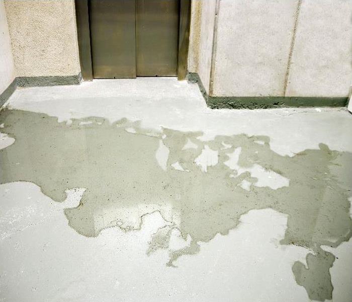 water leak on the floor causing damage